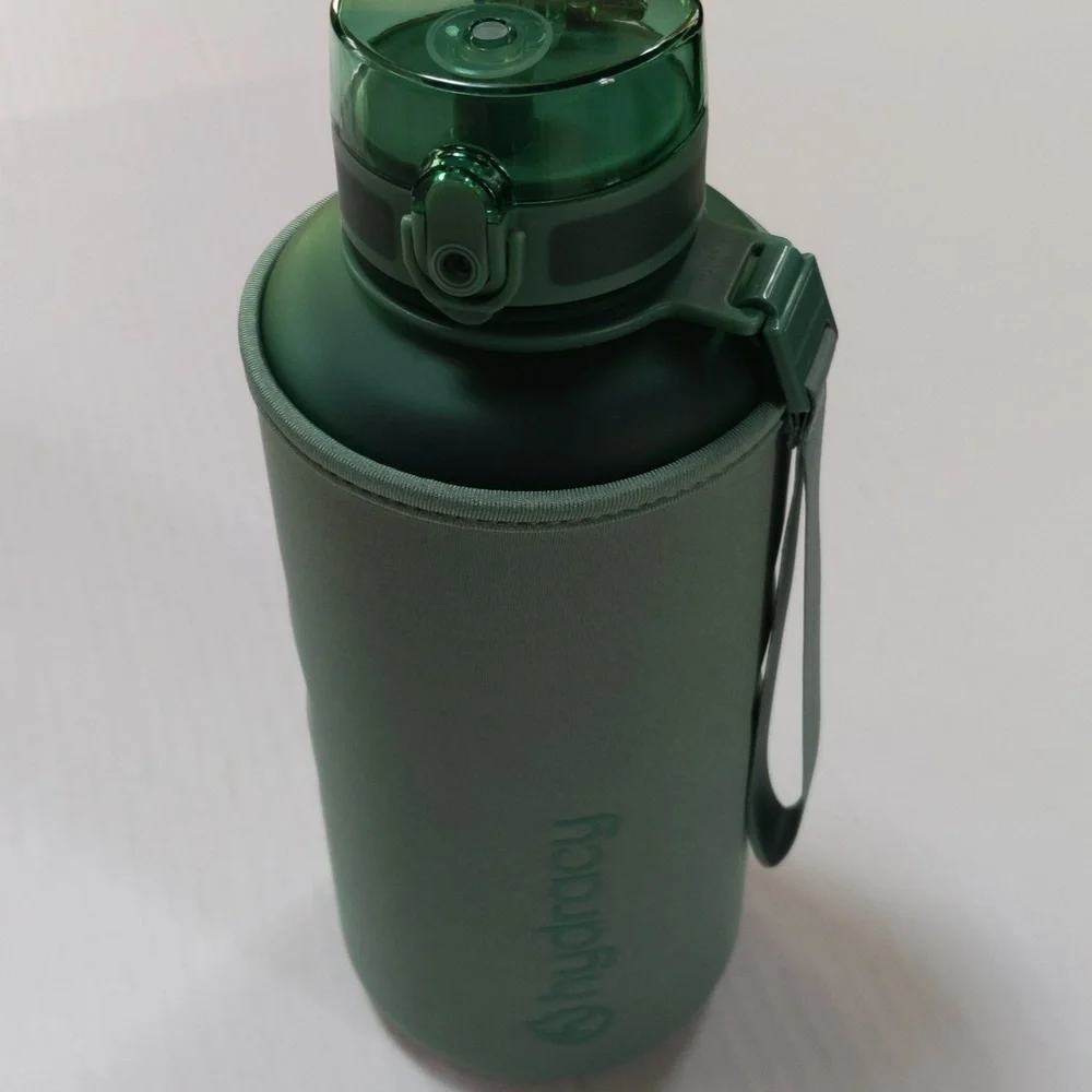 Hydracy, sage green 64 Oz water bottle with insulation/ condensation sle…